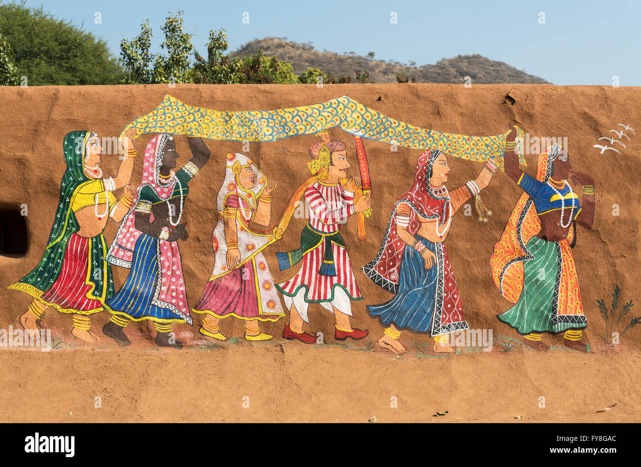 Traditional painting on a clay wall in rural Rajasthan, Shilpgram