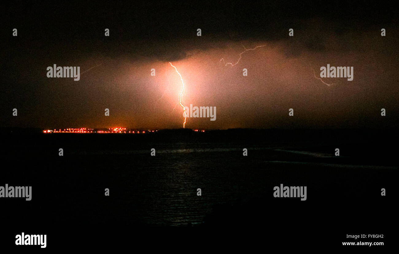 Dramatic lightning strikes, Killyleagh village, seen across Strangford