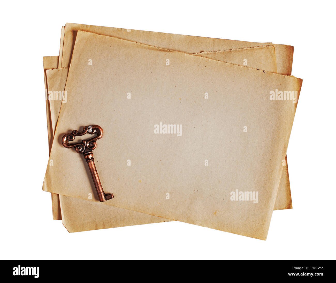Old paper and bronze key isolated on white Stock Photo Alamy