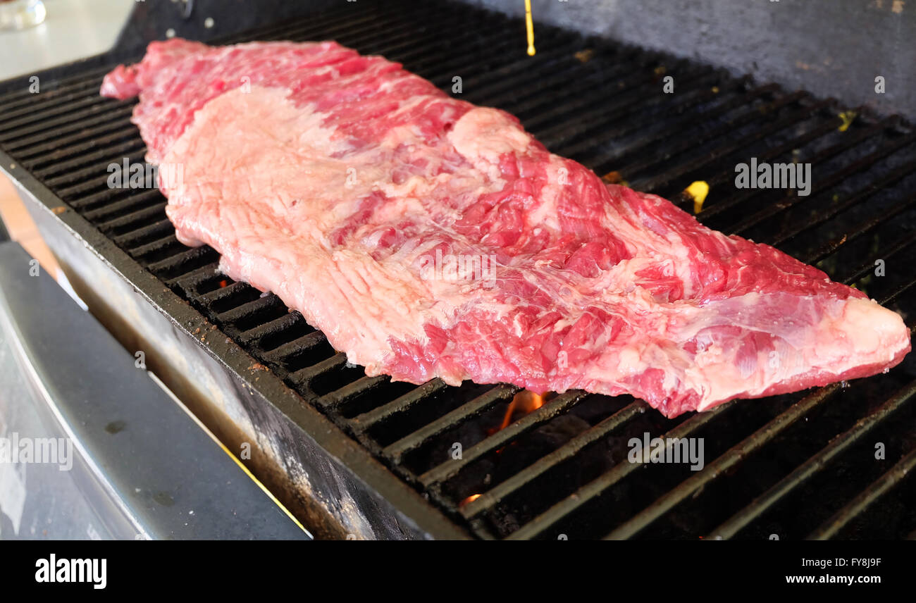 Different views of food prepared on a BBQ. Stock Photo
