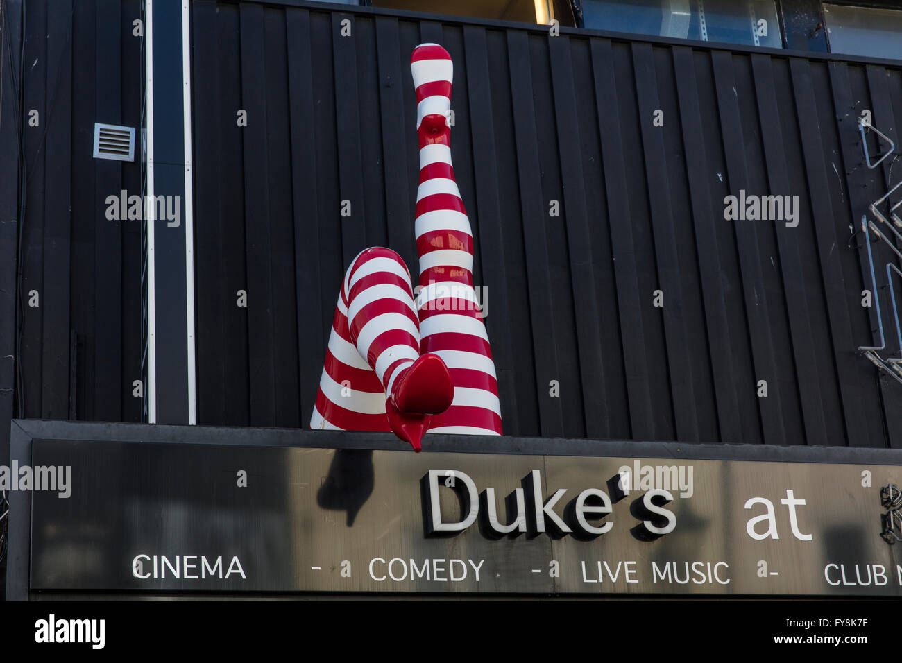 Two legs dressed in red and white socks as a display outside the Duke's at Komedia Cinema and Night club in Brighton Sussex Stock Photo