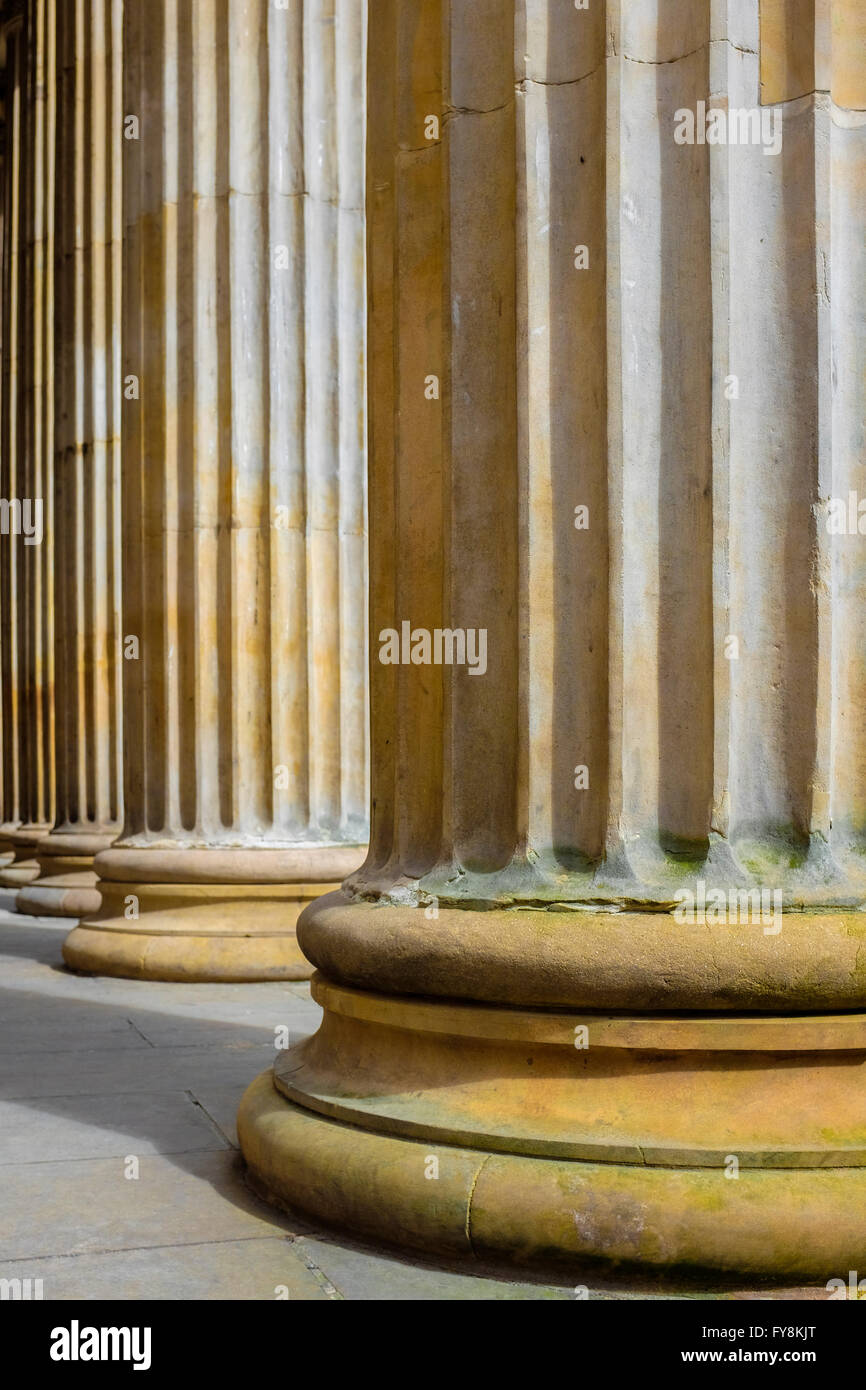 Fluted columns in sunshine, Glasgow Stock Photo