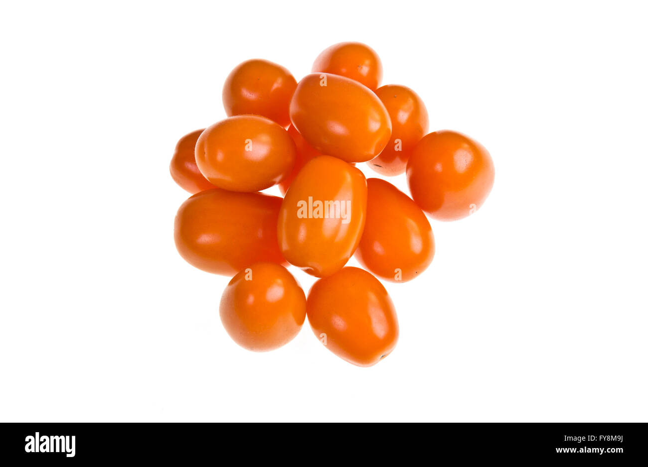 Perino gold tomatoes on a white background Stock Photo - Alamy