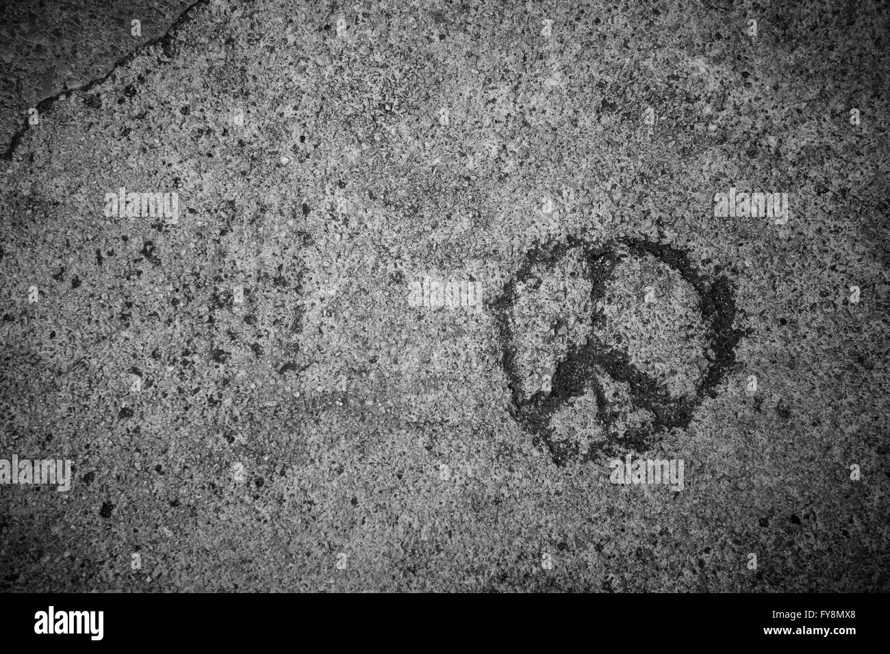 Peace sign carved in a wall Stock Photo