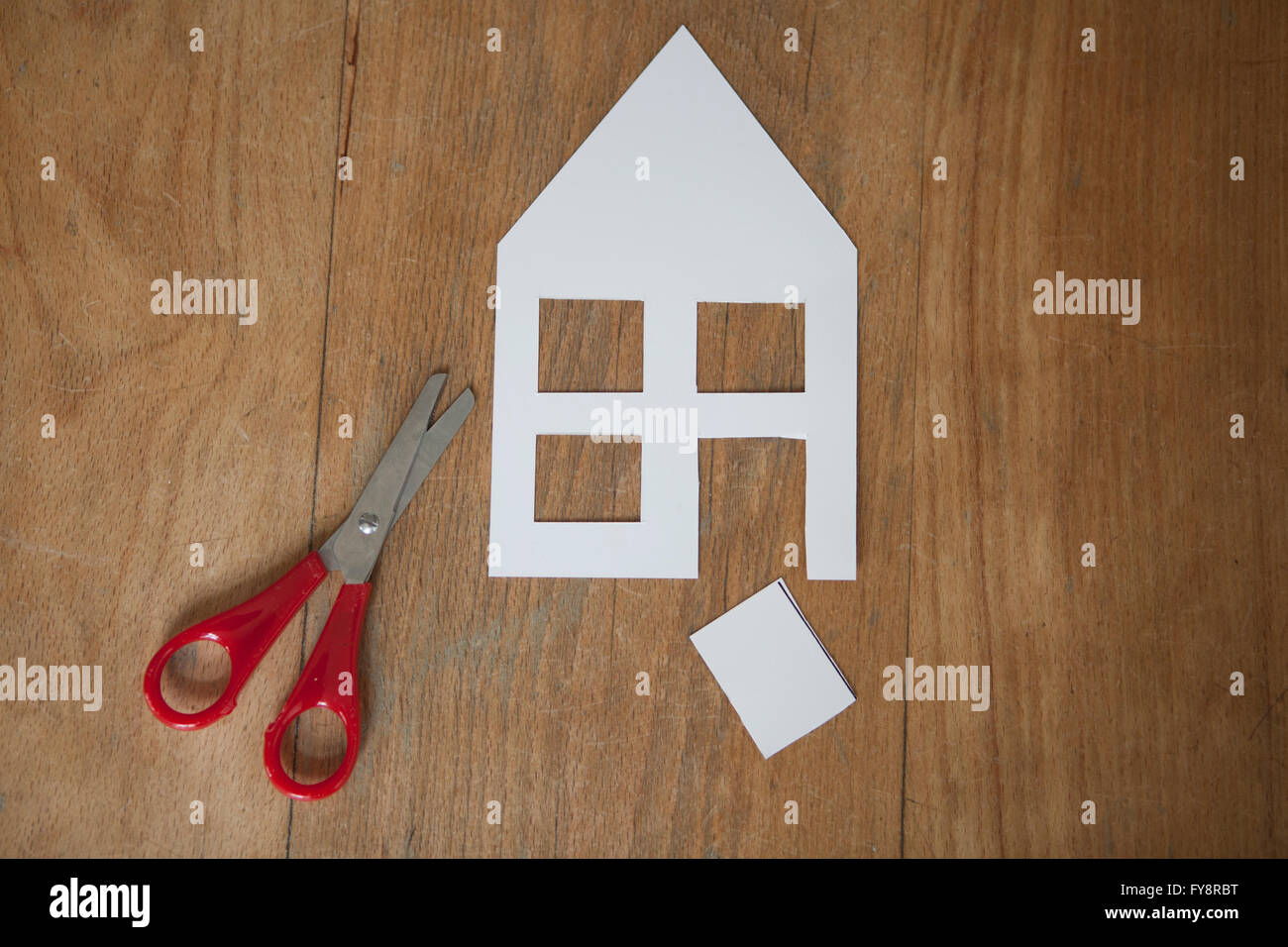 House cutting out of white paper Stock Photo