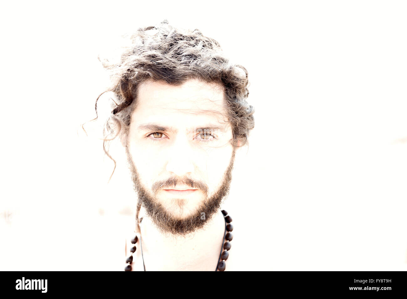 Young man long curly hair hi-res stock photography and images - Alamy