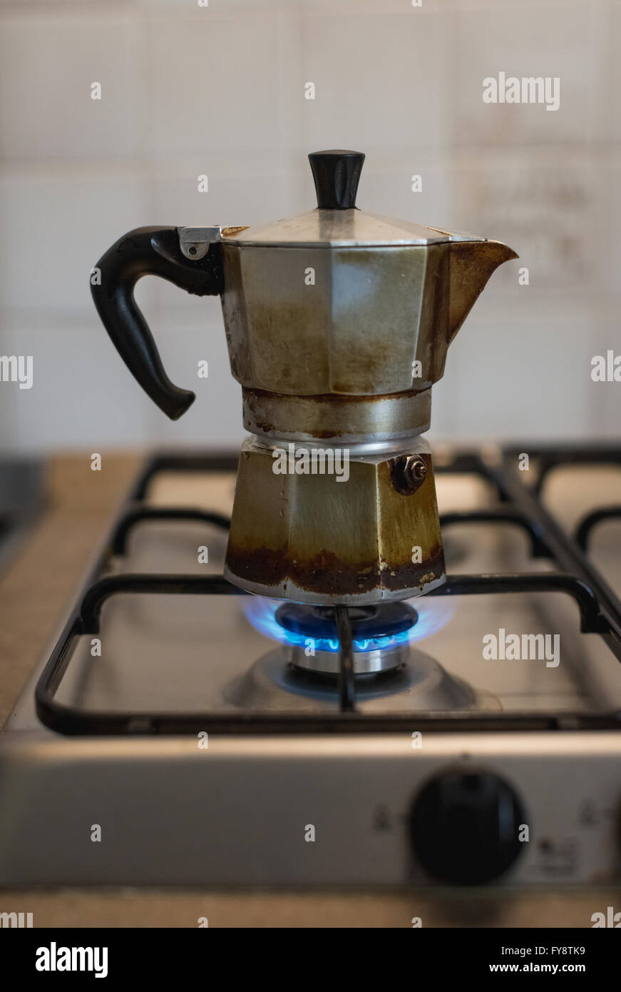 Espresso can on gas stove Stock Photo Alamy