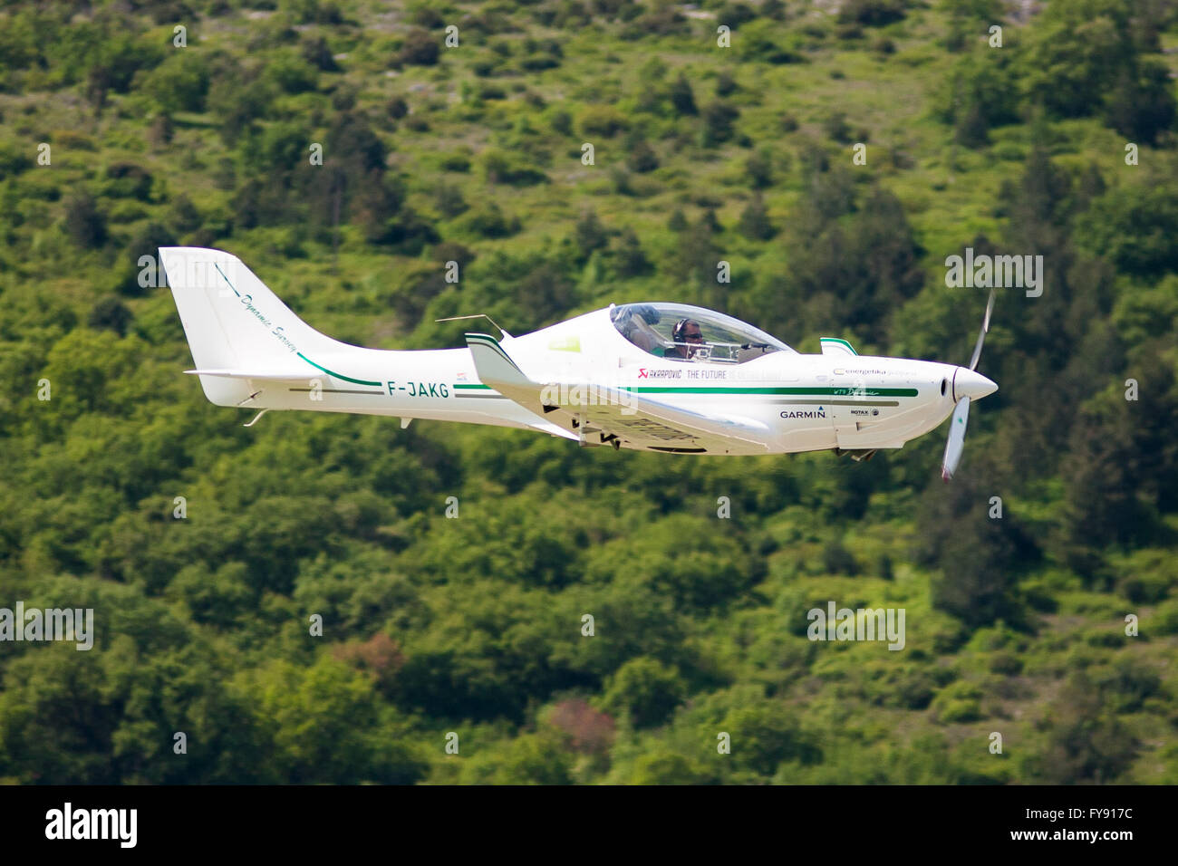 Portoroz, Slovenia. 22nd Apr, 2016. A Dynamic WT 9 ultralight plane driven by Slovenian adventure pilot Matevz Lenarcic is seen over Portoroz airport, Slovenia, on April 22, 2016. Slovenian adventure pilot Matevz Lenarcic successfully completed a 29-day round-the-world solo flight mission GreenLight WorldFlight on Friday, touching down at Portoroz airport after 13 legs and 182 hours in the air. Credit:  Wang Yaxiong/Xinhua/Alamy Live News Stock Photo