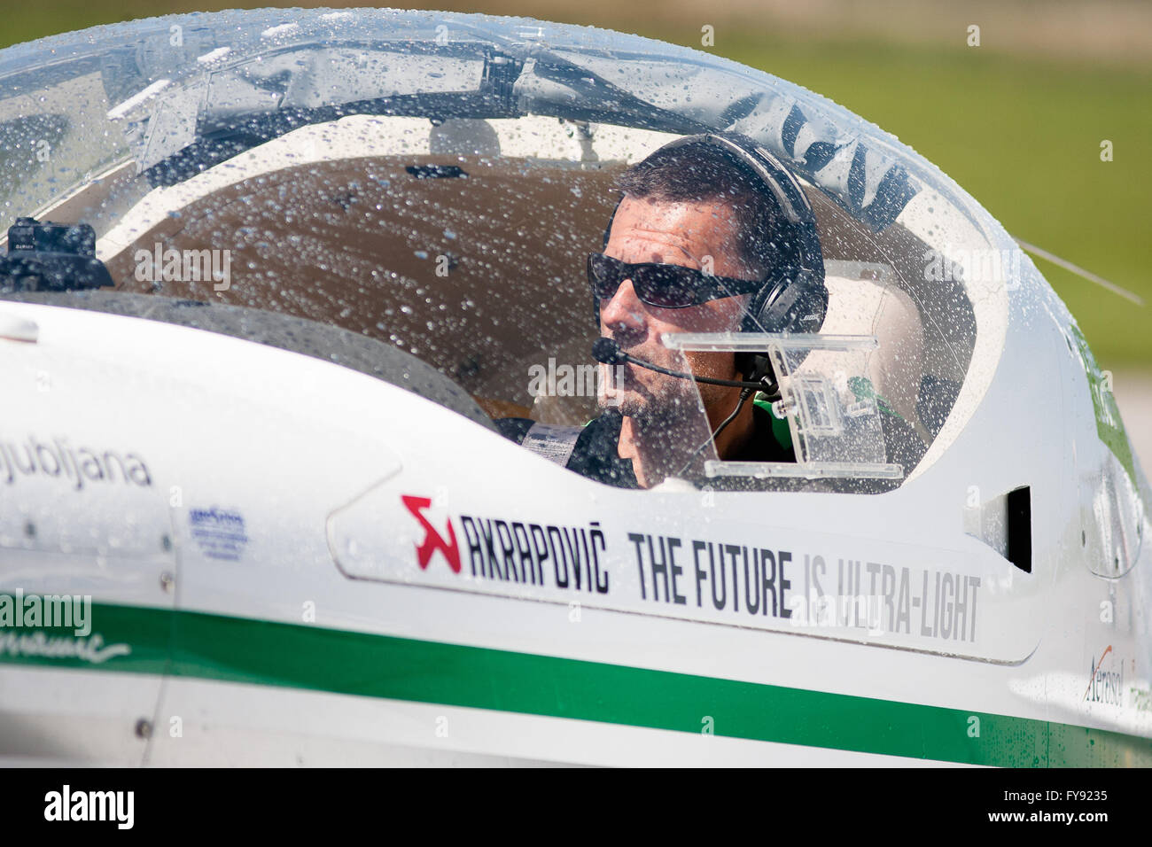 Portoroz, Slovenia. 22nd Apr, 2016. Slovenian adventure pilot Matevz Lenarcic is seen in his Dynamic WT 9 ultralight plane at Portoroz airport, Slovenia, on April 22, 2016. Slovenian adventure pilot Matevz Lenarcic successfully completed a 29-day round-the-world solo flight mission GreenLight WorldFlight on Friday, touching down at Portoroz airport after 13 legs and 182 hours in the air. Credit:  Luka Dakskobler/Xinhua/Alamy Live News Stock Photo