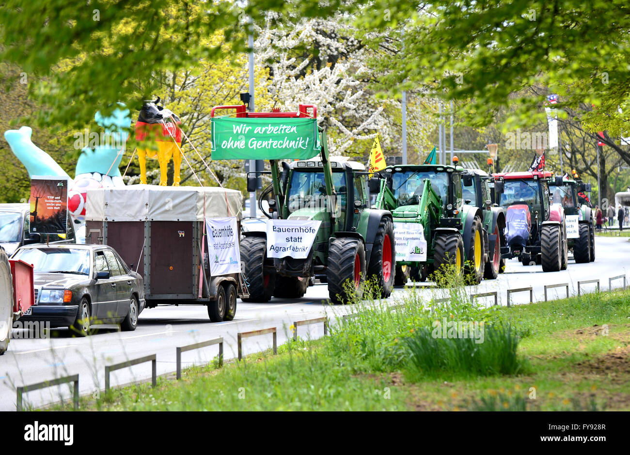 Hanover, Germany. 23rd Apr, 2016. Farmers in about fifty tractors participate in a rally against the controversial transatlantic trade agreement TTIP in Hanover, Germany, 23 April 2016. Organisations for environment and consumer protection as well as for third world relief fear sinking ecological and social standards in Europe and that the agreement gives more power to big corportations. US-President Obama visits the Hanover Messe fair from 24 to 25 April 2016 in Hanover. PHOTO: HAUKE-CHRISTIAN DITTRICH/dpa/Alamy Live News Stock Photo