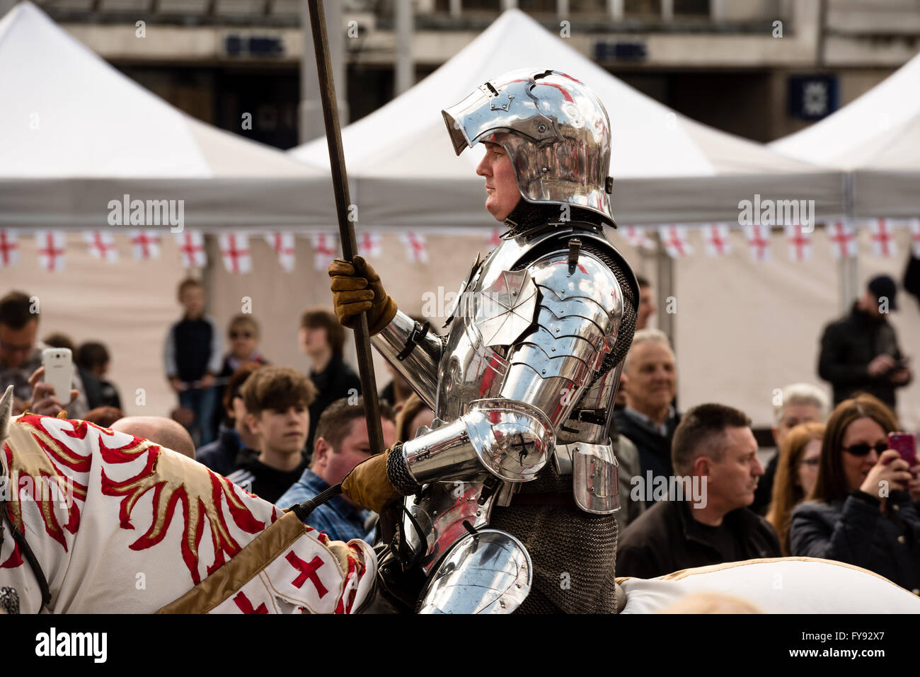 Nottingham, England UK 23 April 2016. Crowds gathered in the old Market Square. to see one of the UK's largest  St George's day parades, organised by the Royal Society of St George. St George is the patron saint of England, and the St George cross is the symbol for the country. Credit:  Mike Gibson /Alamy Live News. Stock Photo