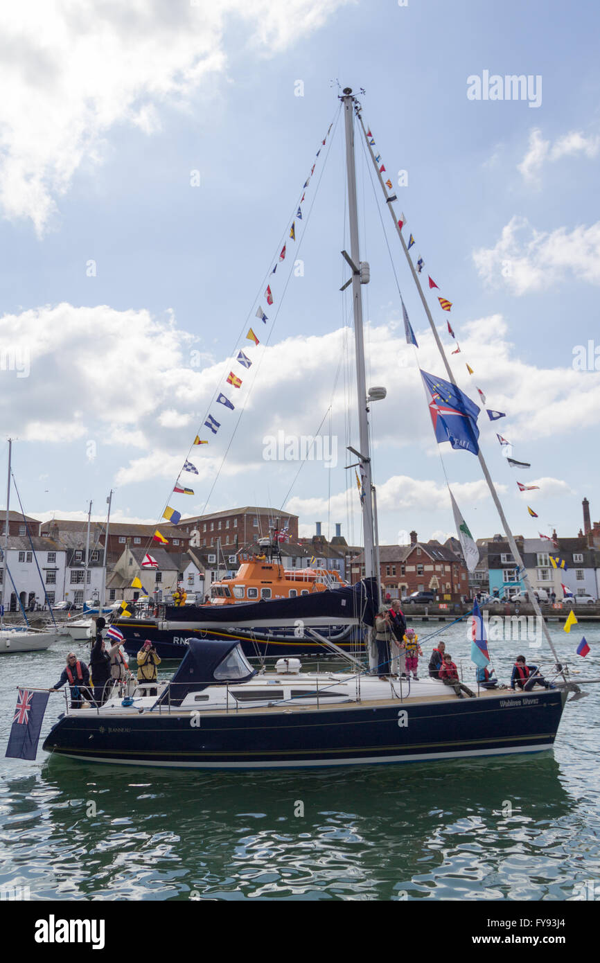 Weymouth, England. 23 April 2016. Queen's 90th Birthday Floating Tribute. Sailing boat with flags. Credit:  Frances Underwood/Alamy Live News Stock Photo