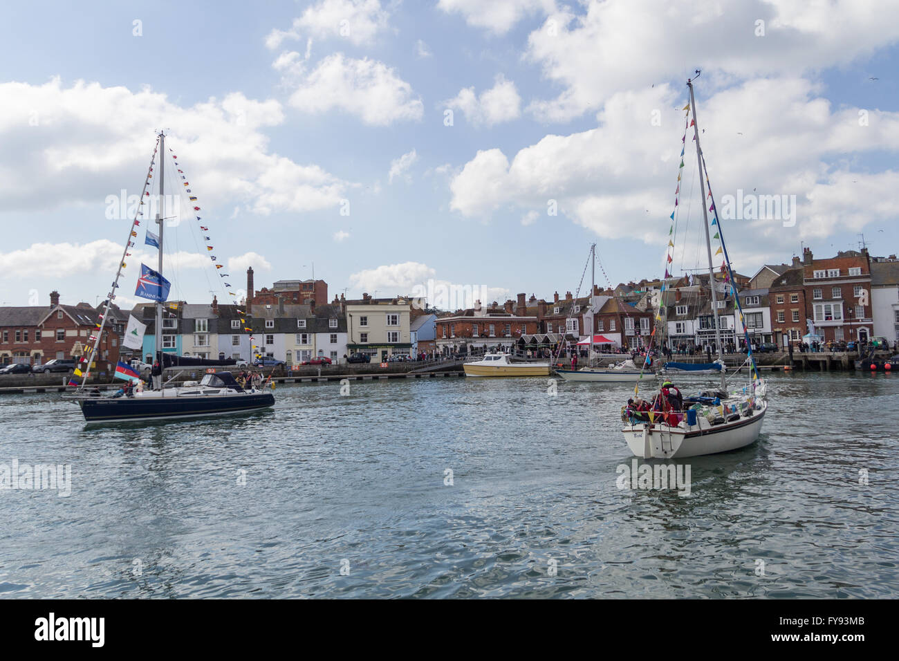 Weymouth, England. 23 April 2016. Queen's 90th Birthday Floating Tribute. Sailing boats with flags in harbour. Credit:  Frances Underwood/Alamy Live News Stock Photo