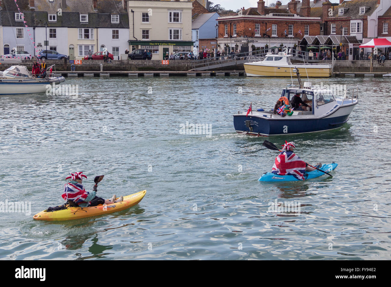 Weymouth, England. 23 April 2016. Queen's 90th Birthday Floating Tribute. People in canoes wearing Union Flag. Credit:  Frances Underwood/Alamy Live News Stock Photo