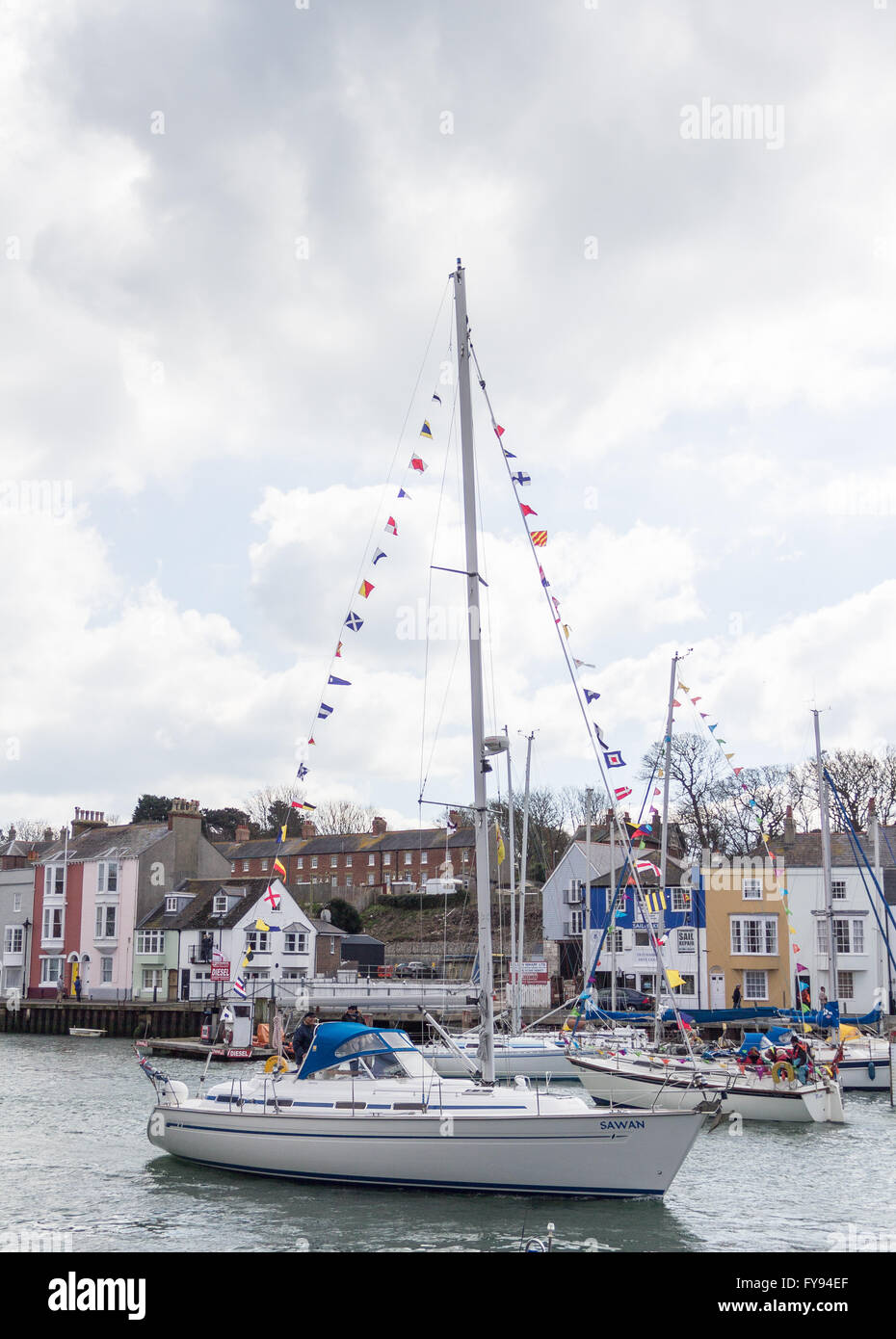 Weymouth, England. 23 April 2016. Queen's 90th Birthday Floating Tribute. Sawan decked with flags. Credit:  Frances Underwood/Alamy Live News Stock Photo