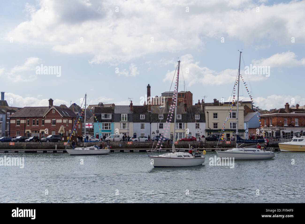 Weymouth, England. 23 April 2016. Queen's 90th Birthday Floating Tribute. Sailing boats in harbour decked with flags. Credit:  Frances Underwood/Alamy Live News Stock Photo