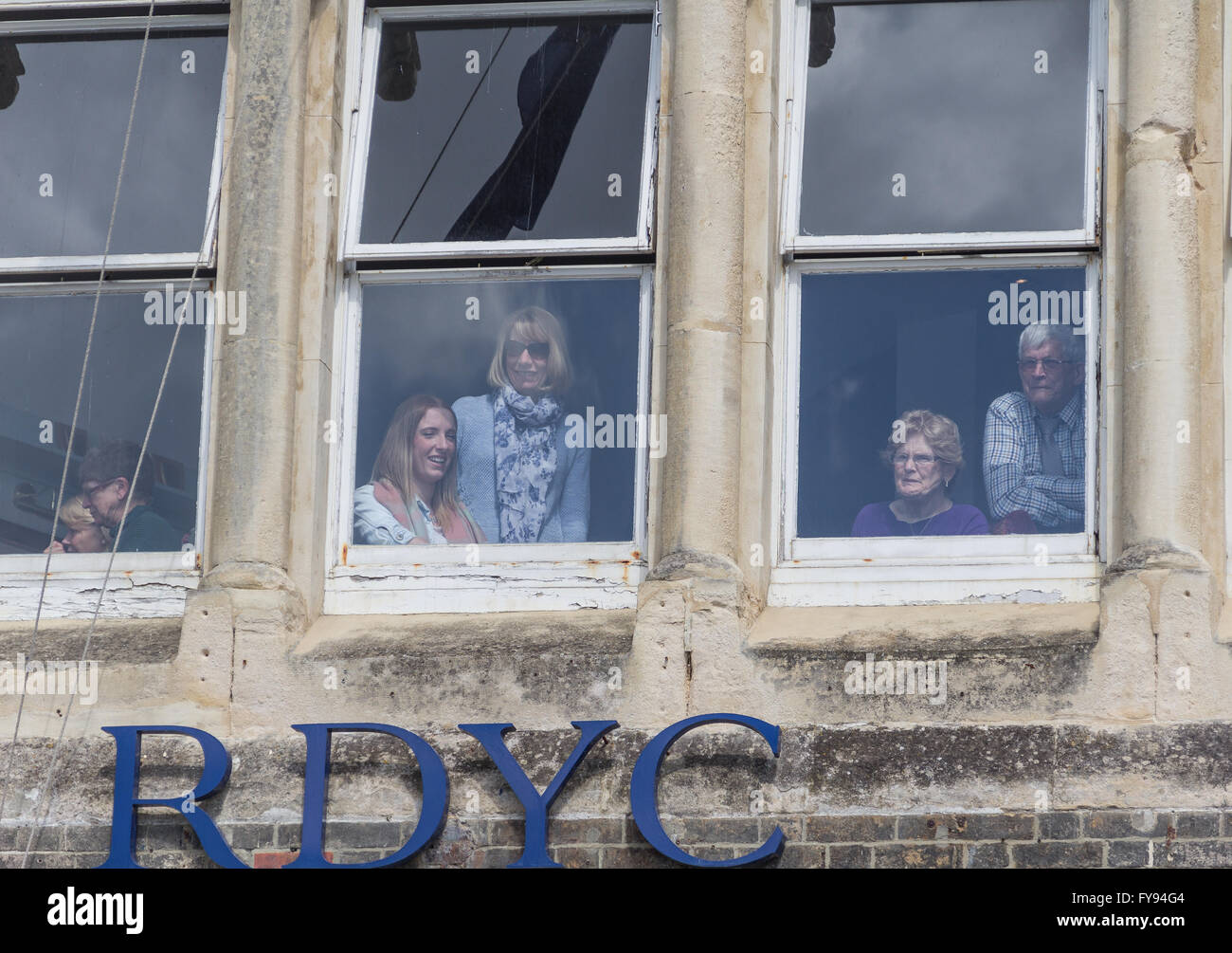 Weymouth, England. 23 April 2016. Queen's 90th Birthday Floating Tribute. Spectators at Royal Dorset Yacht Club. Credit:  Frances Underwood/Alamy Live News Stock Photo