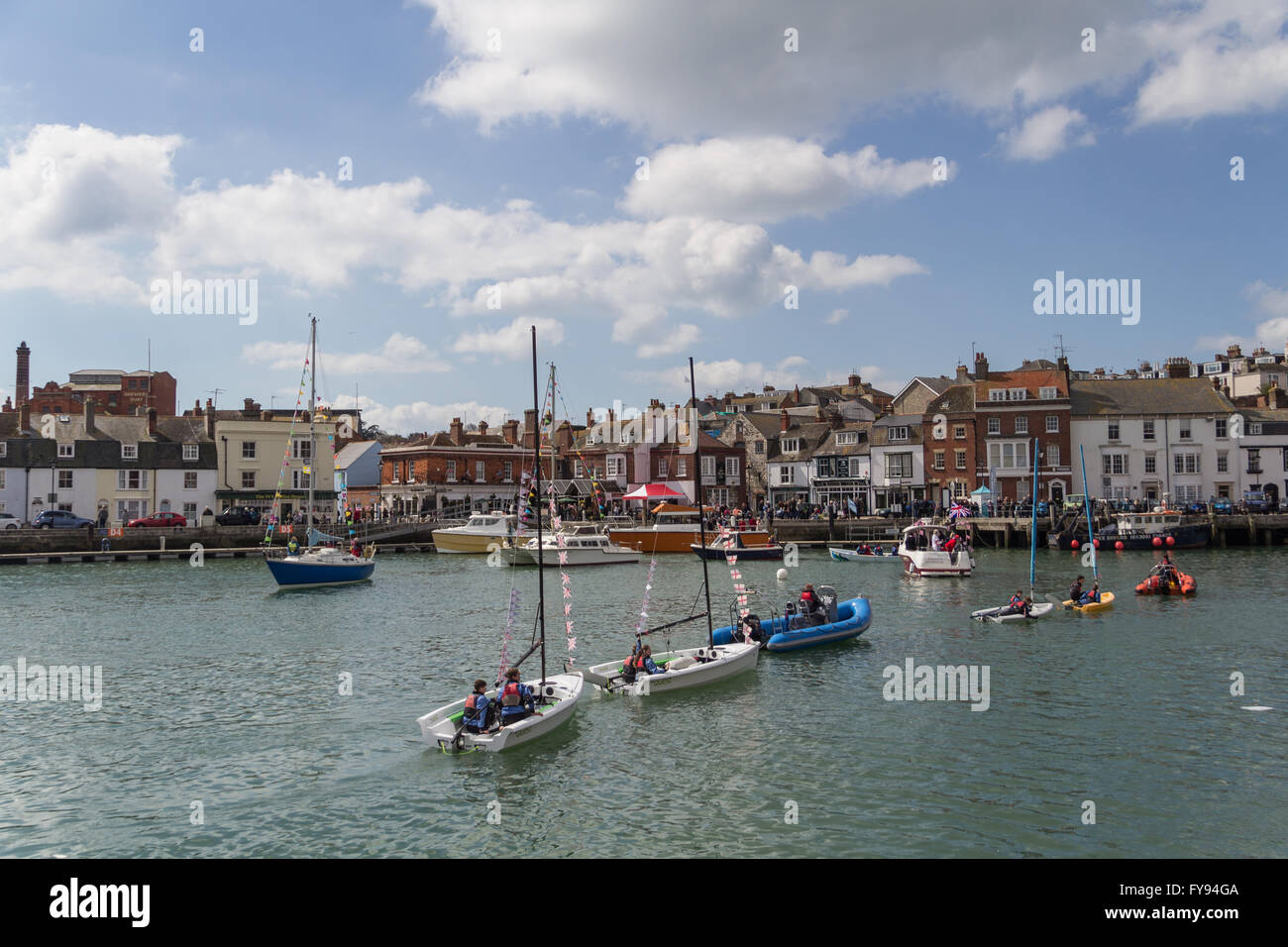 Weymouth, England. 23 April 2016. Queen's 90th Birthday Floating Tribute. Small boat flotilla, turning. Credit:  Frances Underwood/Alamy Live News Stock Photo