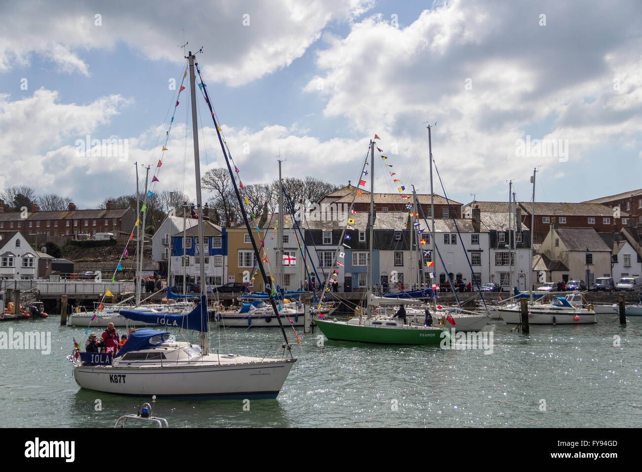Weymouth, England. 23 April 2016. Queen's 90th Birthday Floating Tribute. Several boats in harbour, decked with flags. Credit:  Frances Underwood/Alamy Live News Stock Photo
