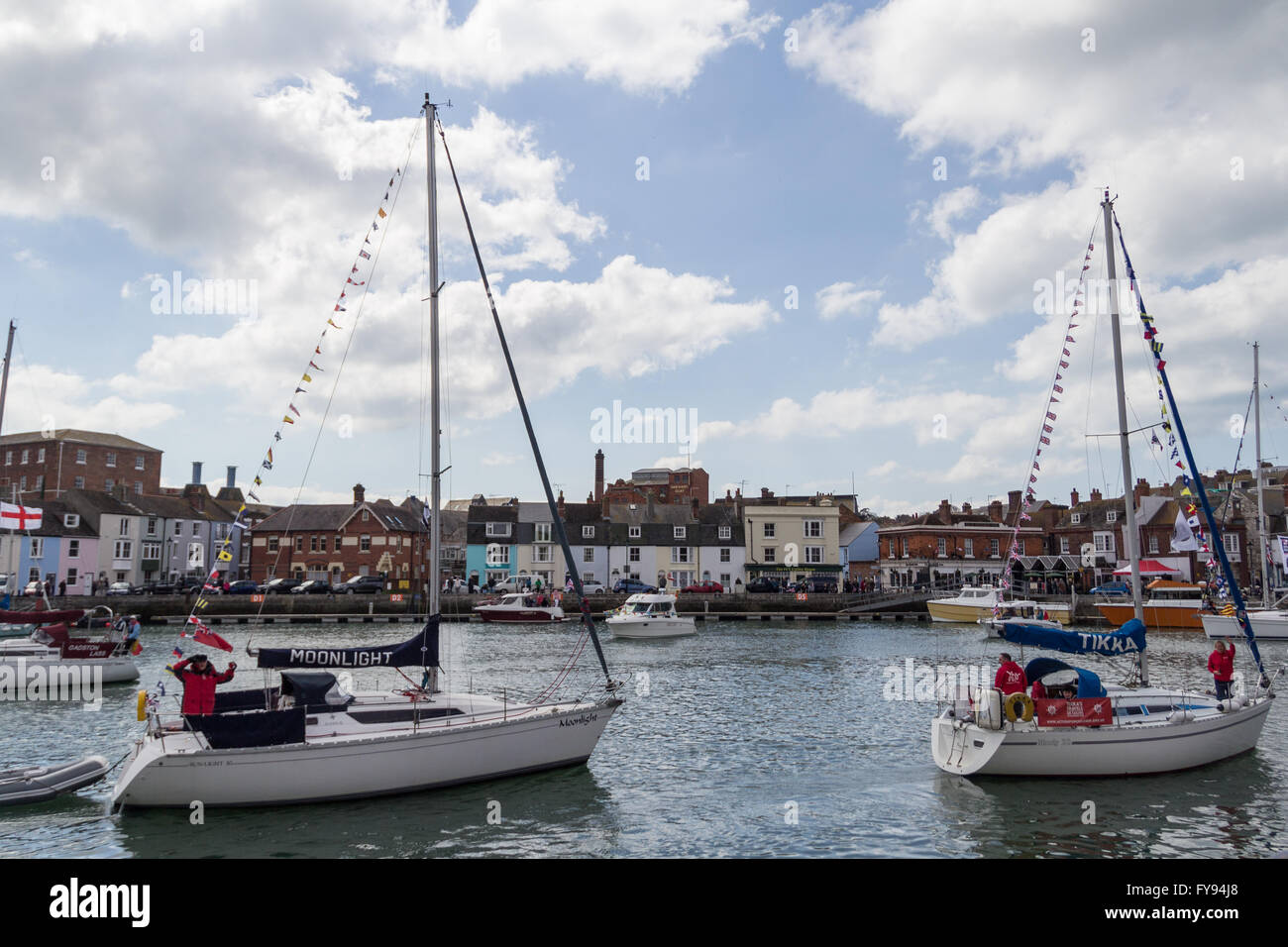 Weymouth, England. 23 April 2016. Queen's 90th Birthday Floating Tribute. Moonlight and Tikka. Credit:  Frances Underwood/Alamy Live News Stock Photo