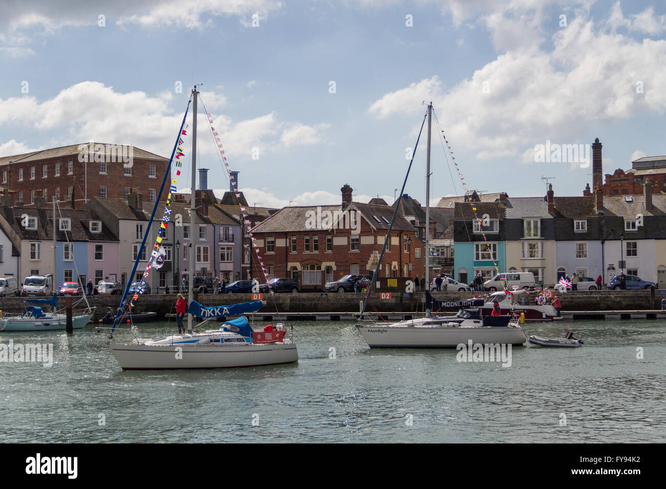 Weymouth, England. 23 April 2016. Queen's 90th Birthday Floating Tribute. Tikka and Moonlight returning. Credit:  Frances Underwood/Alamy Live News Stock Photo