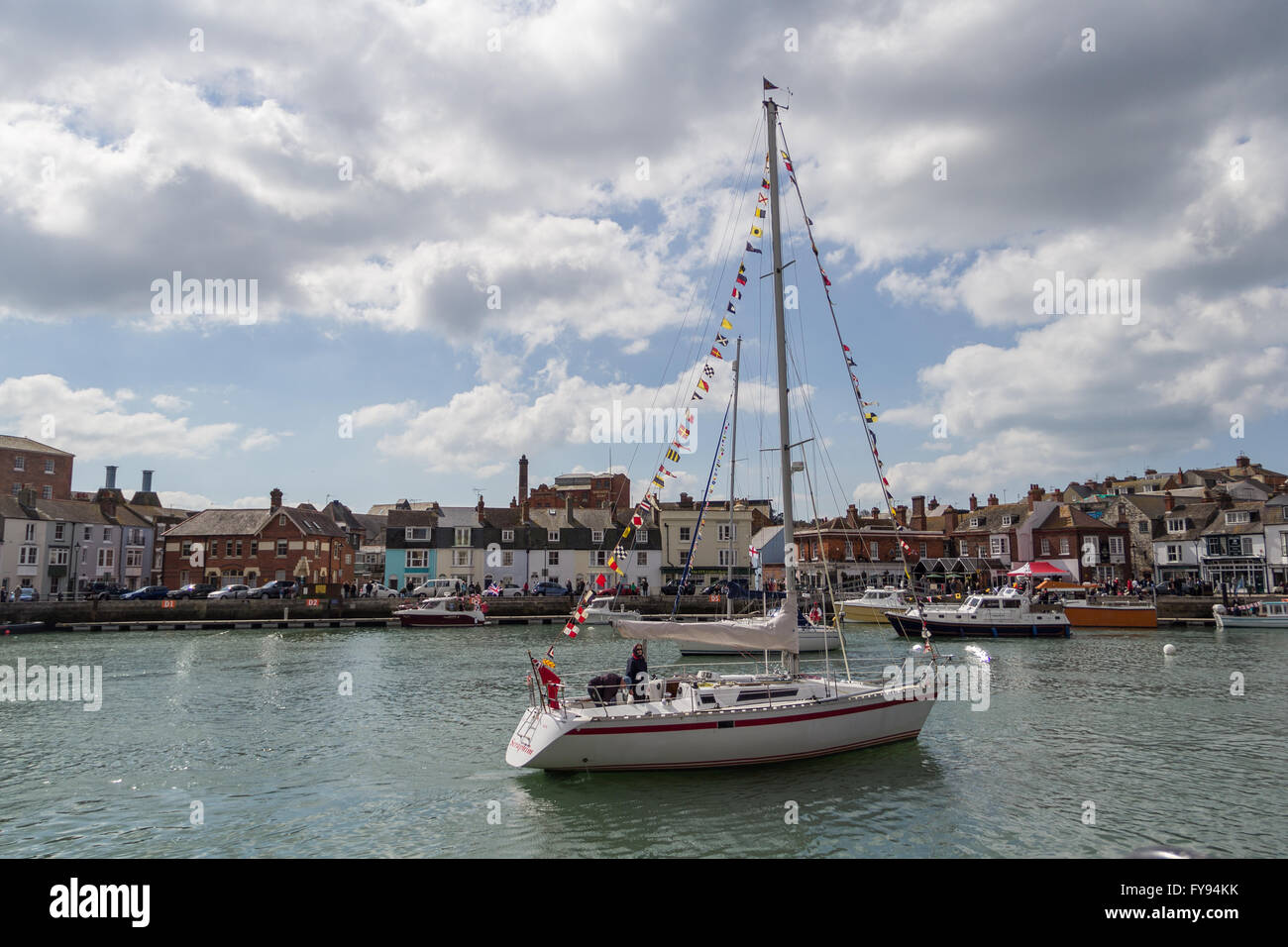 Weymouth, England. 23 April 2016. Queen's 90th Birthday Floating Tribute. White boat in harbour. Credit:  Frances Underwood/Alamy Live News Stock Photo