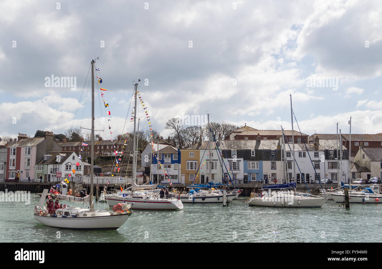 Weymouth, England. 23 April 2016. Queen's 90th Birthday Floating Tribute. Overall scene of harbour, boats decked with flags. Credit:  Frances Underwood/Alamy Live News Stock Photo