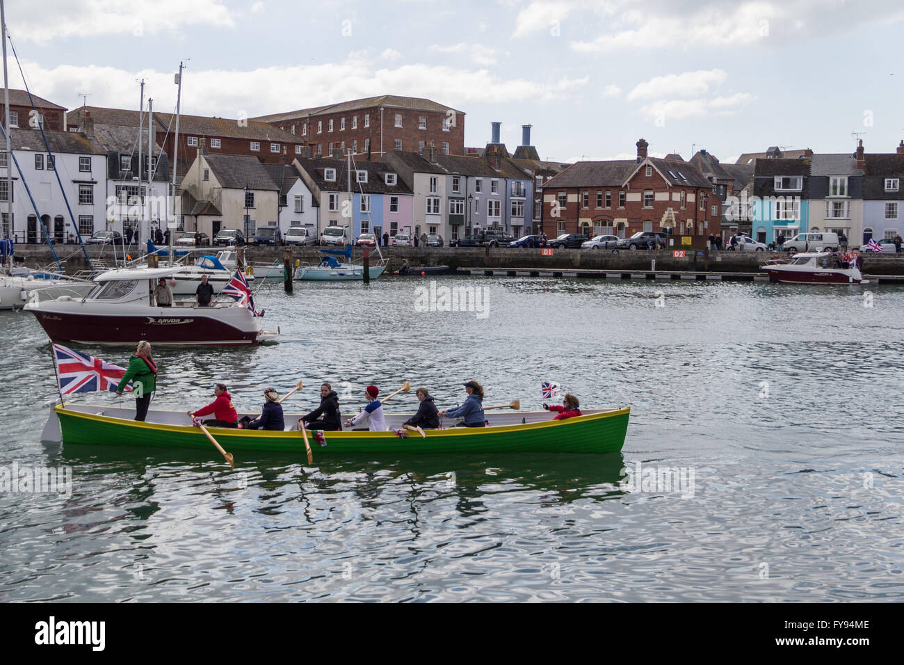 Weymouth, England. 23 April 2016. Queen's 90th Birthday Floating Tribute. Rowing boat with Union Flag. Credit:  Frances Underwood/Alamy Live News Stock Photo