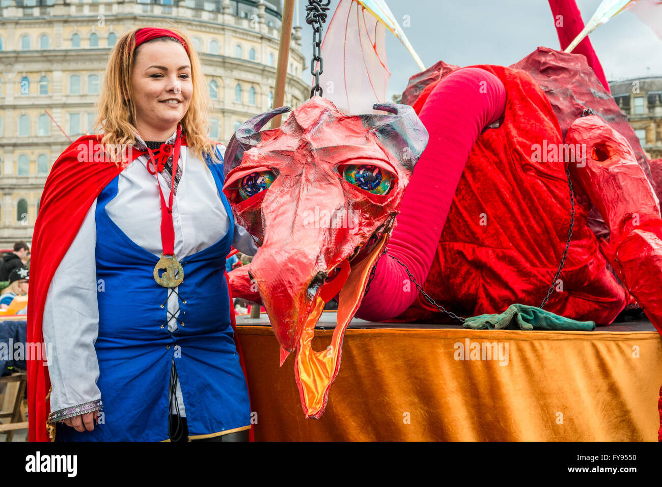 London, UK. 23rd April, 2016. St Georges day celebration at Trafalgar Square. Feast of St Georges festival. Big red interactive puppet dragon. Credit:  Elena Chaykina/Alamy Live News Stock Photo