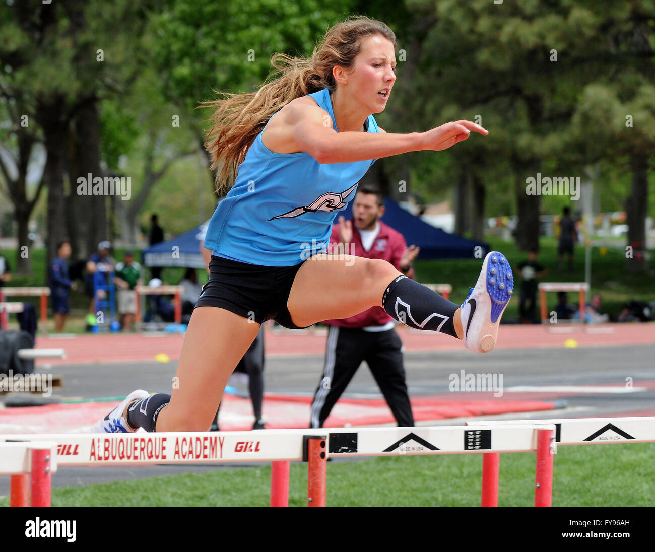 Albuquerque, NM, USA. 23rd Apr, 2016. Cleveland's Sarah Mackin clears the hurdle for the lead in the girls 300 meter hurdles at the Richard Harper track Meet. Saturday, April. 23, 2016. © Jim Thompson/Albuquerque Journal/ZUMA Wire/Alamy Live News Stock Photo