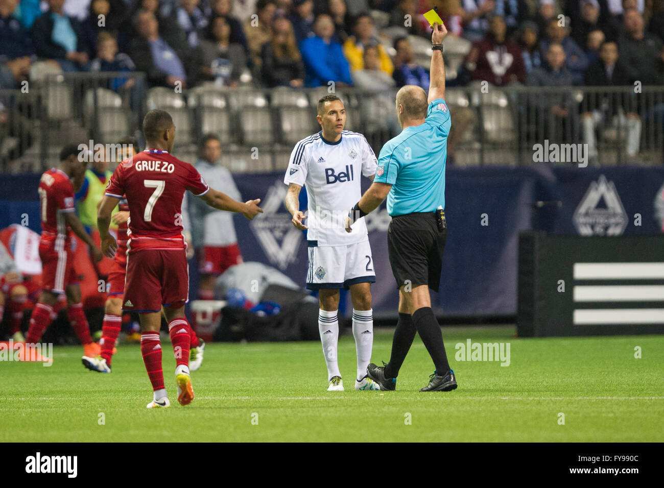 Vancouver, Canada. 23, April, 2016. MLS Soccer - Forward, Blas Perez is given a yellow card. Vancouver(white) vs Dallas(red), Vancouver wins 3-0. BC Place Stadium.  Credit:  Gerry Rousseau/Alamy Live News Stock Photo