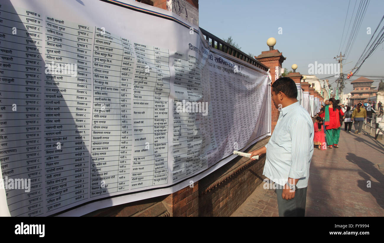 Kathmandu, Nepal. 24th Apr, 2016. A Nepalese man reads the name list of  earthquake victims at Hanumandhoka Durbar Square in Kathmandu, Nepal, April  24, 2016. Nepalese people are marking the one-year anniversary