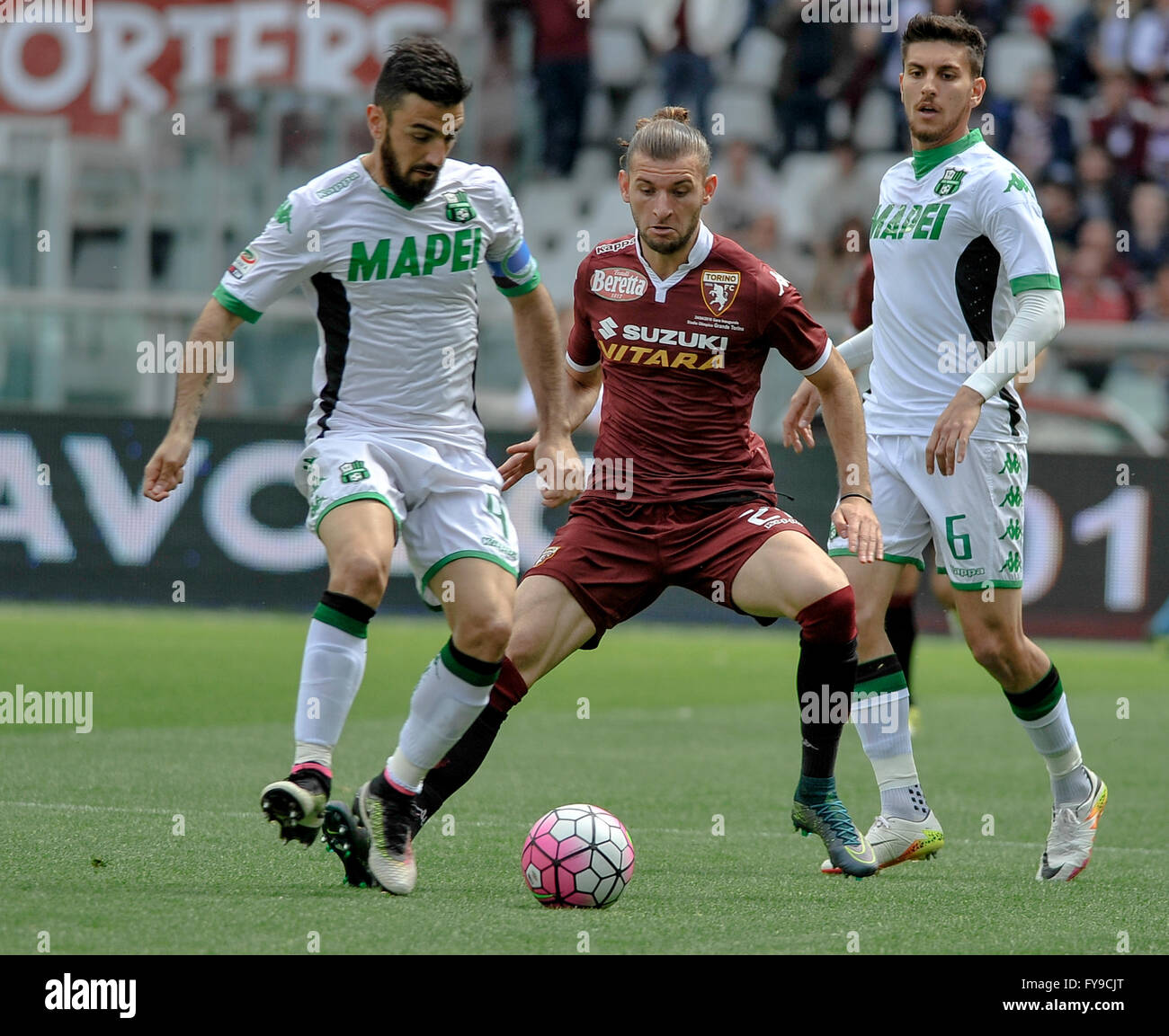Turin, Italy. 24 april, 2016: Francesco Magnanelli (left) and Gaston Silva during the Serie A football match between Torino FC and US Sassuolo. Credit:  Nicolò Campo/Alamy Live News Stock Photo
