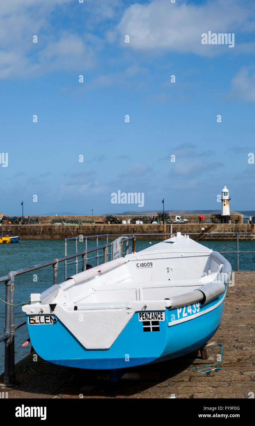 A book docked on W Pier , St Ives Cornwall England UK GB Stock Photo