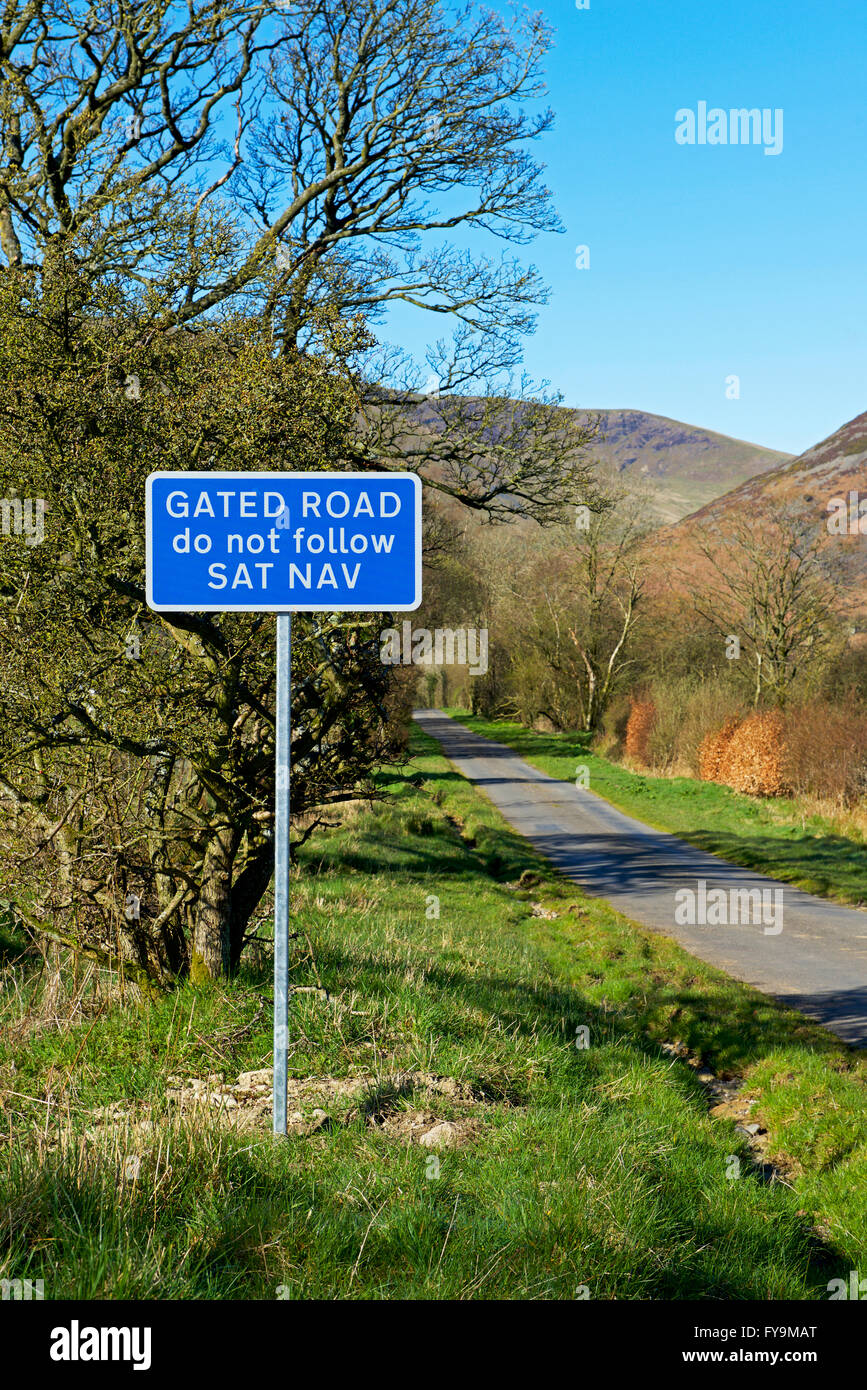 Sign Gated road, do not follow satnav, Cumbria, England UK Stock Photo
