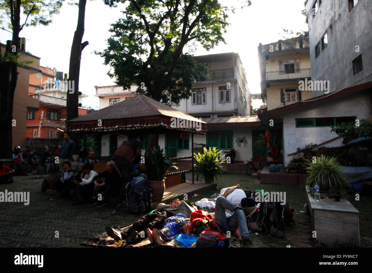 On April 25th 2015, Nepal was struck by huge earthquake. Image taken 2 hours after the first quake. Tourists in hotel courtyard Stock Photo