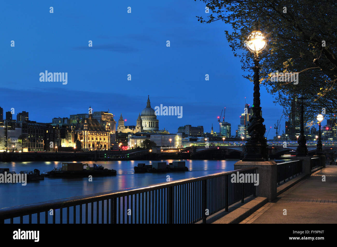 City of London UK at night, from the South Bank with St Pauls Cathedral Stock Photo