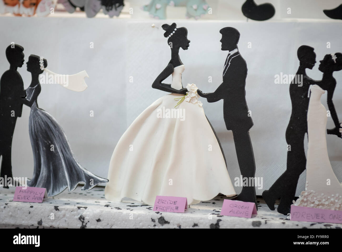 Bride and groom wedding in love at Cake International – The Sugarcraft, Cake Decorating and Baking Show in London Stock Photo