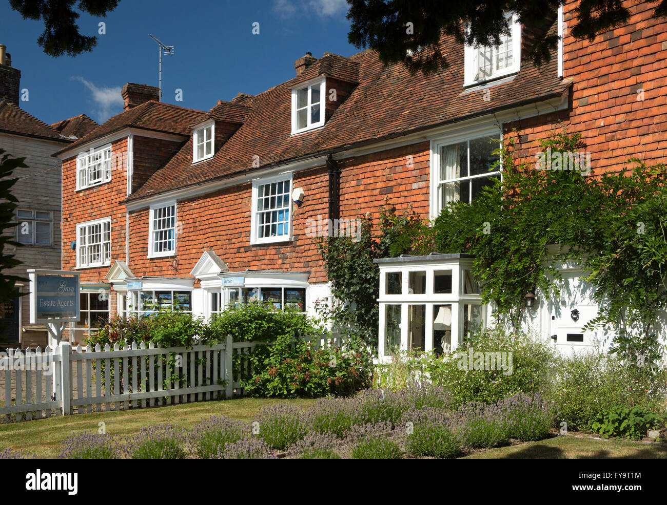 UK, Kent, Tenterden, Ashford Road, homes and businesses in traditional tile hung properties Stock Photo
