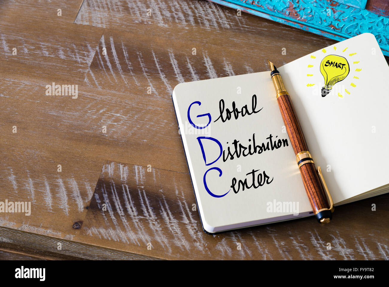 Conceptual Business Acronym GDC Global Distribution Center. Retro effect and toned image of a fountain pen on a notebook Stock Photo