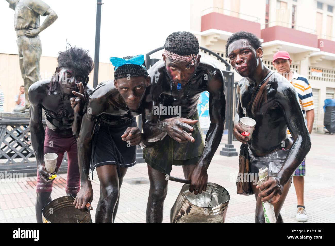 oil covered street artists during carnival in the capital Santo Domingo