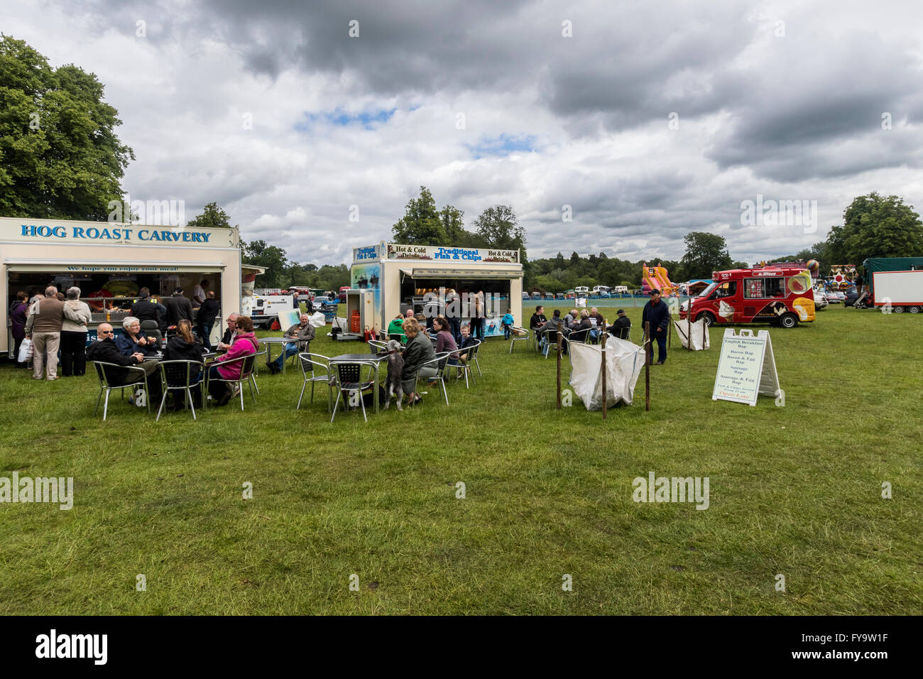 People taking a break at a mobile café at steam rally Astle Park