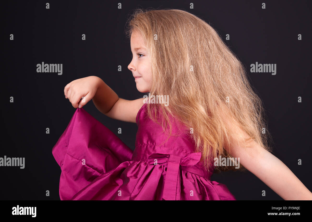 Portrait of a cute little girl in a pink dress in the studio Stock ...