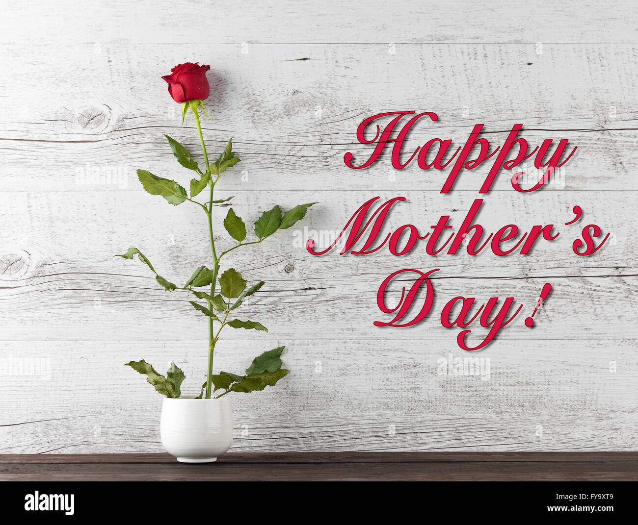 Happy Mother's Day text with one red rose on rustic wood Stock Photo ...