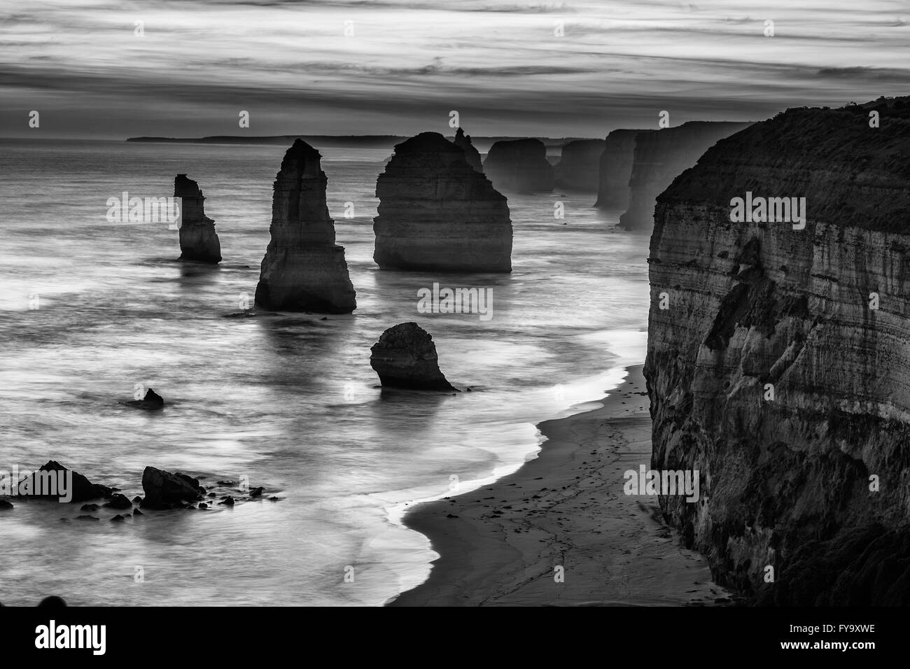 Twelve Apostles rock formations, Great Ocean Road, Victoria, Australia. Black and white image. Stock Photo