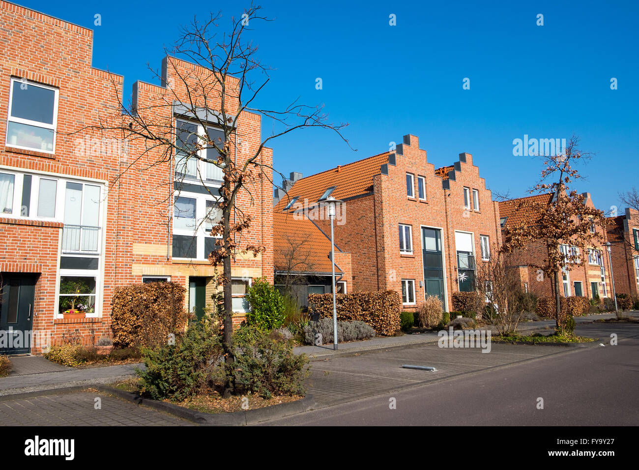 Modern neighborhood with red brick houses in Berlin, Germany Stock