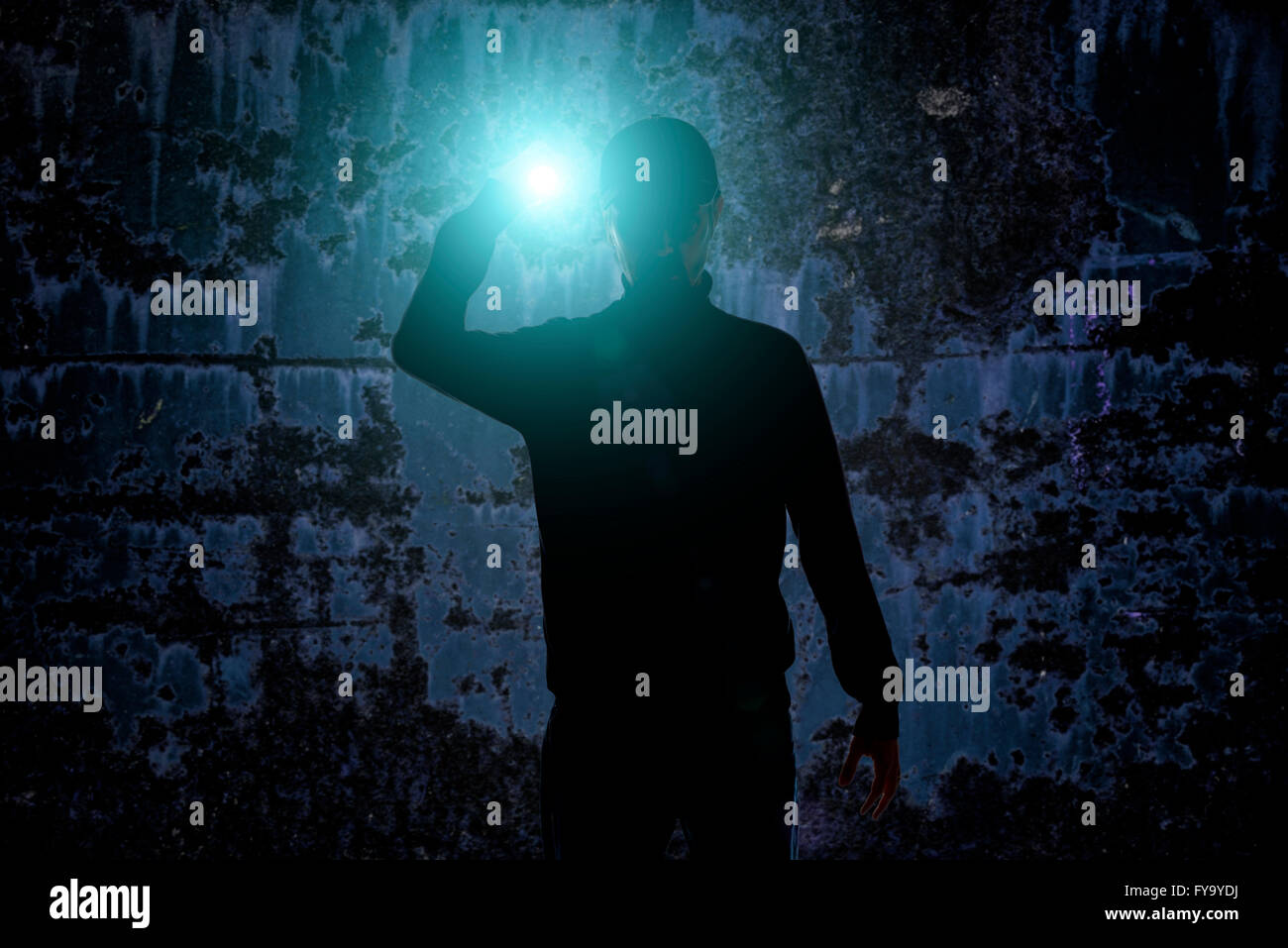 Man with torch light dark hires stock photography and images Alamy