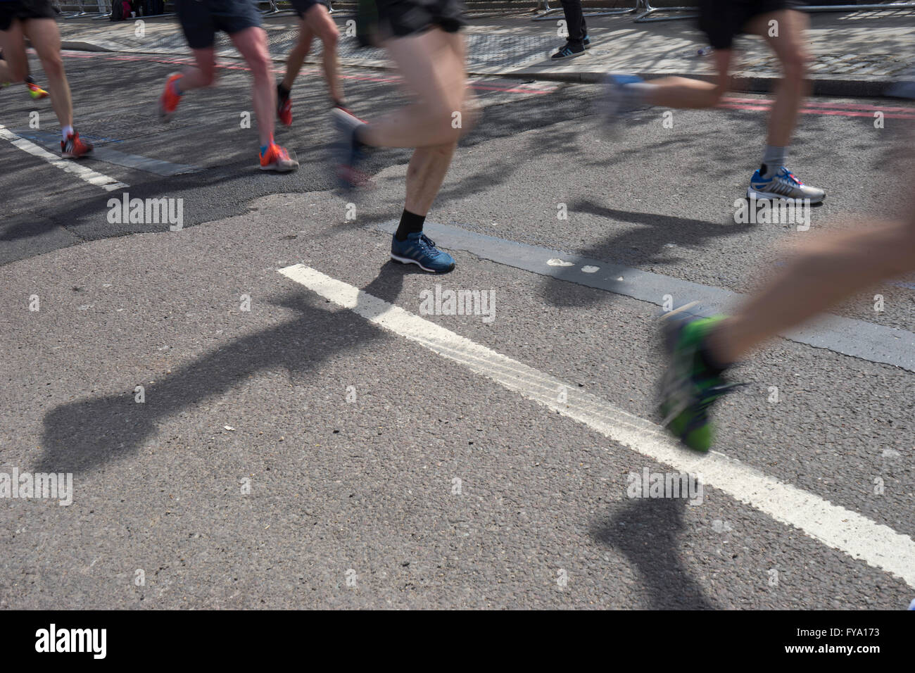 Runners near Tower Bridge at the 2016 London Marathon. UK Stock Photo