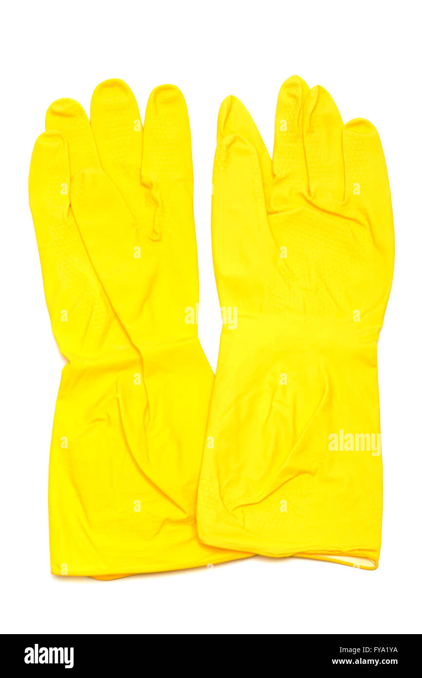 Yellow rubber gloves on a white background Stock Photo - Alamy