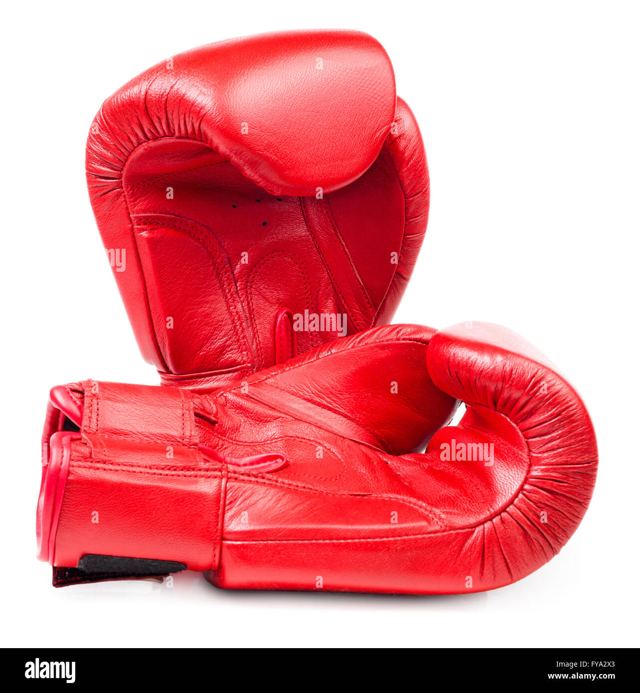 Pair of red leather boxing gloves isolated on white background Stock